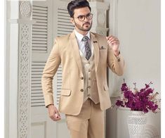 This is a Classic  Suit by Golden Attire crafted from high quality fabric and imported materials. Our products are handcrafted by experienced tailors who make sure the that the stitching is precise, lining is proper and the overall product is sturdy enough to not go out of shape for more than a few years. Also all our products have extra margins in their length, sleeves, sides so it's easily alterable if your size changes after some time. To see more available colours and designs in this collect Elegant Beige Unstitched Suit For Formal Occasions, Beige Business Suit With Collar, Beige Blazer For Groom, Beige Tailored Suit For Wedding, Beige Tailored Double Breasted Suit For Wedding, Beige Three-piece Suit For Semi-formal Occasions, Classic Beige Sets For Groom, Cream Suit With Suit Collar For Groom, Beige Notch Lapel Blazer For Groom