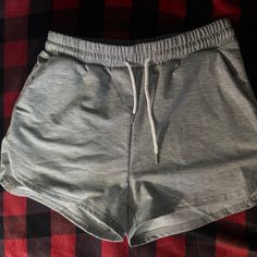 Have Pockets Brandnew Never Worn Casual Gray Athletic Shorts For Summer, Gray Summer Athletic Shorts, Gray Leisure Athletic Shorts For Summer, Summer Leisure Gray Athletic Shorts, Casual Gray Bottoms For Day Out, Trendy Gray Shorts With Elastic Waistband, Casual Gray High-waisted Shorts, Casual Athletic Shorts For Day Out, Shein Shorts