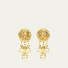 Ben-Amun clip earrings. 24-karat gold electroplating. Pearly white glass dangles. Approx. 2.5"L x 1.25"W. Clip-on backs. Made in USA. White Gold Plated Chandelier Earrings, Elegant Drop Clip-on Earrings With Latkans, Gold-tone Drop Clip-on Earrings With Plating, Elegant Clip-on Earrings With Latkans, White Gold-plated Drop Earrings, Gold Clip-on Bridal Drop Earrings, Gold Plated Clip-on Pearl Drop Earrings, Gold Drop Clip-on Earrings With Latkans, Gold-tone Drop Clip-on Earrings