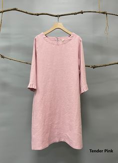 "Simple tunic dress with dressy ruffled sleeves (or even hem if you prefer ), a no brainer pick for many occasions. -100% medium weight linen -Half sleeves with ruffled edge -Above the knee length -Back button closure -Hem ruffle can be added upon request with additional cost Please provide your shoulder width, full bust measurement ( measured around the fullest part ), your lower hip measurement and your height in the note to seller box. Don't see your size? Please message us for custom made or Spring Dresses With Ruffle Hem And Relaxed Fit, Summer Dress With Ruffle Hem And 3/4 Sleeves, Summer Dresses With Ruffle Hem And 3/4 Sleeves, Summer Ruffle Dress With Half Sleeves, Spring Dresses With Ruffles In Relaxed Fit, Spring Midi Dress With Ruffles, Relaxed Fit, Spring Midi Dress With Ruffles And Relaxed Fit, Solid Color Shift Dress With Half Sleeves, Solid Shift Dress With Half Sleeves