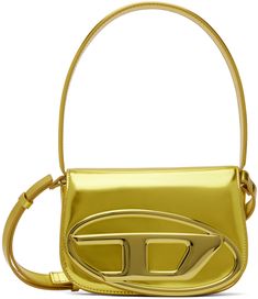 Patent leather shoulder bag in metallic yellow. · Fixed shoulder strap · Adjustable and detachable crossbody strap · Logo hardware at face · Magnetic press-stud flap · Patch pocket at two-compartment interior · Logo-woven moiré lining · H5 x W7.5 x D2.25 Supplier color: Yellow Designer Gold Flap Bag With Adjustable Strap, Modern Gold Flap Bag With Adjustable Strap, Modern Gold Bag With Logo Hardware, Modern Gold Flap Bag With Branded Hardware, Modern Gold Shoulder Bag With Branded Hardware, Designer Gold Shoulder Bag With Logo Hardware, Modern Gold Flap Bag With Metal Hardware, 1dr Bag, Diesel 1dr