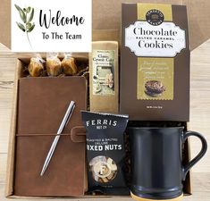 a box with coffee, cookies and chocolates in it