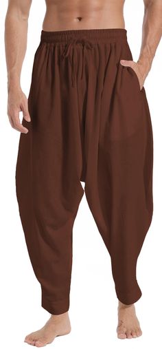 PRICES MAY VARY. Elasticated waist and ankles with two side pockets. Aladdin and hippie style adds a trendy and unique touch to your wardrobe. Wear these harem pants for men as loose fit cosplay pants, fashionable street wear, Halloween pants, dance pants, lounging pants, juggling clothes, hippie clothes & much more. Perfect for indoor and outdoor activities, or lounging around the house, these comfy mens harem pants with elastic waist effortlessly take you from day to night in superior quality comfort. The men's baggy harem pants are made of soft fabric, comfortable and breathable, harem trousers with wide leg and 2 slant side pockets for convenient storage of keys or cellphone. Perfect for the Halloween, dance, cosplay, casual wear, outing, lounging around the house or in the park. House Clothes Comfy, Mens Harem Pants, Halloween Pants, Baggy Harem Pants, Clothes Comfy, Waistband Design, Halloween Dance, Harem Trousers, Pants With Elastic Waist