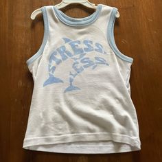 Urban Outfitters Tank Top -Xs -Nwot -Originally $35 White Y2k Tank Top For The Beach, White Y2k Tank Top For Beach, Y2k White Tank Top For Beach, 90s Style Tank Top With Letter Print For Spring, 90s Style Letter Print Tank Top For Spring, 90s Style Spring Tank Top With Letter Print, White Y2k Beach Top, White Stretch 90s Tops, 90s White Stretch Tops