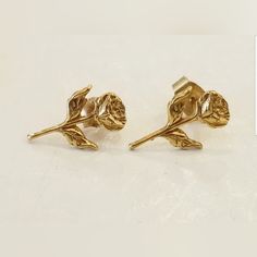 Vintage 14k Gold Rose Stud Earrings Metal- Solid Gold Stamped/Tested- 14k Markings No Longer Visible Given Age, But Did Test As 14k See Photos Color Gold- Yellow Gold Approx. Length- 1/2" (See Photos) Condition- Used/Vintage, Has Regular Wear Approx. Weight: 0.71grams Yellow Gold Rose Design Earrings As Gift, Yellow Gold Earrings With Rose Design For Gift, Yellow Gold Earrings With Rose Design As Gift, Gold Rose Design Earrings For Anniversary, Formal Rose Gold Earrings With Rose Design, Gold Rose Earrings For Gift, Rose Gold 14k Flower Earrings For Wedding, Formal Gold Earrings With Rose Design, Rose Gold 14k Flower Earrings For Anniversary