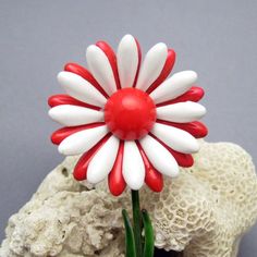 Vintage flower brooch on stem is a wonderful pop of color with a green stem and red and white flower.  In excellent vintage condition, signed Original by Robert,  3 1/2 inches tall with the flower being about 1 5/8 inch in diameter.Find lots more vintage jewelry at Purple Daisy Jewelry!http://www.etsy.com/shop/purpledaisyjewelryThanks a bunch for shopping for vintage jewelry at Purple Daisy Jewelry on Etsy! Red Handmade Flower Brooches, Handmade Red Flower Brooches, Red Flower-shaped Brooch With Handmade Flowers, Handmade Vintage Red Brooches, Daisy Jewelry, Purple Daisy, Thanks A Bunch, Flower Brooch, White Flower