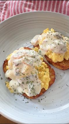 two pieces of bread with eggs on them