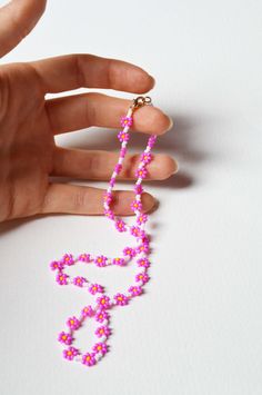 Pink Flower Beaded Necklace, Pink Diy Jewelry, Seed Bead Necklace Flower, Pink Beaded Necklace With Flower Pendant, Pink Beaded Flower Pendant Jewelry, Pink Beaded Flower Pendant Necklace, Pink Flower Necklaces With Tiny Beads, Pink Flower Necklace With Tiny Beads, Pink Flower-shaped Necklace With Tiny Beads