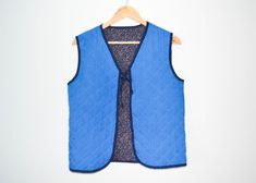 Blue Women's stepped Vest Steampunk Waistcoat Cotton stepped Vest Women Suede vest Sleeveless Blazer cotton waistcoat Towed on both sides blue or flower Estimated Size: Small   Measurements (lying flat): Length - 22 inch (56 cm) Pit to pit - 18.5 inch (47 cm) Please check measurements to insure a proper fit. Remember to allow yourself some extra room for movement. You can compare these with something from your closet that fits you well. Condition: good Vintage Condition SHIPPING * I ship worldwi Winter Cotton Sleeveless Vest, Sleeveless Cotton Denim Vest For Winter, Blue Cotton Vest For Spring, Blue Cotton Vest With Pockets, Steampunk Waistcoat, Sleeveless Blazer, Suede Vest, Vest Women, Vest Outfits