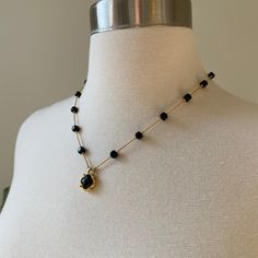 "Signed Monet Gold tone chain Black lucite charm Cube beads 18\" Total length" Gift Onyx Single Strand Jewelry, Black Beaded Necklace With Adjustable Chain As Gift, Single Strand Onyx Jewelry Gift, Onyx Necklace With Adjustable Chain For Gifts, Adjustable Black Wire Wrapped Beaded Necklaces, Adjustable Black Wire Wrapped Beaded Necklace, Black Jewelry With Lobster Clasp And Round Beads, Elegant Black Charm Necklace With Adjustable Chain, Black Round Pendant With Lobster Clasp