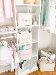 a closet filled with lots of baby clothes and other things to put on the shelves