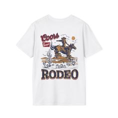 Perfect gift for a someone with a western style. Coors banquet rodeo tee.The unisex soft-style t-shirt puts a new spin on casual comfort. Made from very soft materials, this tee is 100% cotton for solid colors. Heather colors and sports grey include polyester. The shoulders have twill tape for improved durability. There are no side seams. The collar is made with ribbed knitting to prevent curling damage.  .: Made with 100% ring-spun cotton, a lightweight fabric (4.5 oz/yd² (153 g/m this unisex t White Western T-shirt For Rodeo, White Crew Neck Tops For Western-themed Events, Pre-shrunk T-shirt For Western-themed Summer Events, Retro Summer Rodeo T-shirt, Retro Summer T-shirt For Rodeo, White Crew Neck T-shirt For Rodeo, Western Style Relaxed Fit Graphic T-shirt, Western Style Relaxed Fit T-shirt With Graphic Print, Retro T-shirt For Western-themed Summer Events