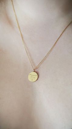 14mm 14K 9K Handwriting Charm Necklace, Personalized Handwritten Pendant, Engraved Disc Necklace, Custom Handwriting Jewelry, Solid gold layering necklace, BFF Gift, Gift for her, FREE EXPRESS SHIPPING Dainty solid gold disc charm necklace engraved with YOUR handwritten message. A personal and beautiful gift for every occasion! ------------------------------------------- D E T A I L S 14K Solid Gold or 9K Solid Gold Disc diameter: 14mm Personalized Handwriting - Both sides can be engraved - Plea Everyday Engraved Gold Plated Charm Necklaces, Everyday Engraved Gold Plated Charm Necklace, Everyday Gold Plated Engraved Charm Necklaces, Gold Pendant Jewelry With Meaningful Style, Engraved Rose Gold Plated Charm Necklace, Meaningful Gold Pendant Necklace, Everyday Gold Engraved Necklace, Round Yellow Gold-plated Name Necklace, 14k Gold Nameplate Necklace With Engraving Option