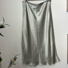 Helmut Lang Double Satin Slip Skirt Color Cement Gray, Size M Preloved In Excellent Condition Like New Used Once For A Wedding. You Can Dress Up With A Sweater Or Any Top . Please See The Picture Have A Water Spot , Needs Dry Cleaning. Silver Lined Skirt For Spring, Elegant Silver Skirt Bottoms, Satin Slip Skirt, Cement Gray, Water Spots, Slip Skirt, Satin Slip, Silk Skirt, Helmut Lang