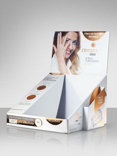 an open cardboard box with a woman's face on the front and bottom side