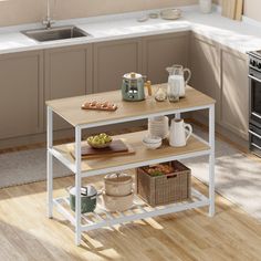 a kitchen with an oven, sink and table in the middle of the flooring area