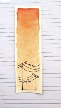 a piece of paper with birds sitting on power lines