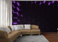 a living room with a couch, chair and wallpaper that has purple lights on it