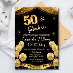 an elegant 50th birthday party with gold balloons and streamers on the black background is shown