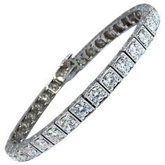 Classic Tennis / Squared Box Bead Set 8.42ct. Natural diamonds bracelet. Round, full cuts G color / Si-1 clarity. 14kt. white gold 20.4 Grams. Width of bracelet: 5.2mm 7.25 inch wearable length safety clasp/ snap lock $48,000 Appraisal Certificate will accompany.