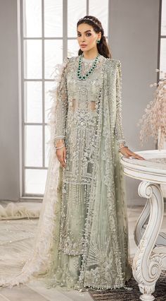 Emerald Green Lehenga Shirt Pakistani Wedding Party Wear is a gracefully embellished piece that gives you a magnificent appearance at your wedding. Fast Shipping Semi-stitched Palazzo Set With Dupatta For Wedding, Floor-length Organza Palazzo Set For Eid, Elegant Palazzo Set With Sheer Dupatta For Reception, Elegant Palazzo Set For Reception With Sheer Dupatta, Eid Organza Floor-length Palazzo Set, Long Sleeve Organza Traditional Wear For Reception, Eid Party Wear Sharara In Organza, Eid Party Wear Organza Sharara, Festive Palazzo Set With Intricate Embroidery For Party Wear