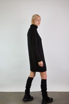 This dress with a high neck is an example of extreme softness and comfort. The comfort will be provided by the long ruffled sleeves, ruffled bottom and straight model of the dress. Monala knits are handmade, making each garment unique. We strive to preserve and nurture this old craft by creating a basic wardrobe. Garment is knitted from 100% merino wool on manual knitting machine. Seams are sewn with sewing machine and hand crafted to give the best quality. Please check the last photo for the si Tunic Turtleneck Dress, Turtle Neck Oversized Dress, Turtle Neck Sweater Dress With Back Chain, Luxury Turtleneck Sweater Dress, Luxury Turtleneck Sweater Dress For Women, Black High Neck Sweater. Dress, Mock Neck Tunic Dress, Knit Turtleneck Dress, Knitted Dress Outfit