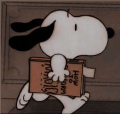 a cartoon character holding a book in his hand