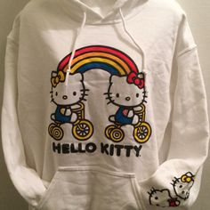 Brand New Hello Kitty And Mimmy Hoodie Large Hello Kitty And Mimmy Graphic On Front, Hello Kitty And Mimmy Face On Sleeve Size: Medium New With Tags Offers Welcome, Make Me An Offer. White Hoodie With Cartoon Print For Spring, White Hooded Kawaii Top, Cute White Winter Hoodie, Kawaii White Hoodie For Spring, White Kawaii Hoodie With Drawstring, Cute Cat Print Hooded Hoodie, Cute Winter Cat Print Hoodie, Cute Winter Hoodie With Cat Print, Hello Kitty Print Hooded Hoodie For Winter