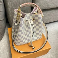 This Pre-Loved Bag Is A Limited Style In White Damier With Pink And White Braided Handle. Great Condition 7.9 X 8.9 X 5.1 Inches Louis Vuitton Neonoe, Bags Louis Vuitton, Louis Vuitton Bags, Pink And White, Bucket Bag, Pink White, Bag Lady, Louis Vuitton, Shoulder Bag