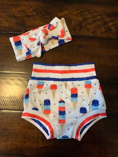 What's sweeter than a cute outfit for the 4th of July? Help your little one celebrate in style with this adorable Bummies set! The best part is ice cream is good all summer long, so your babe can keep rocking it!  *Made from Modern Jersey fabric- a lightweight drapey knit with a cotton like feel. Pre-Washed. Machine wash and dry. **ORDER BY JUNE 27TH FOR DELIVERY BEFORE JULY 4TH Sweet Style White Bottoms For Summer, Sweet White Bottoms For Summer, Sweet White Summer Bottoms, White Bottoms For 4th Of July Beach Outing, White Beach Bottoms For 4th Of July, White Patriotic Bottoms For Summer, Fun Fitted White Bottoms, Patriotic White Bottoms For Summer, Cute Fitted Diaper Cover For Playwear