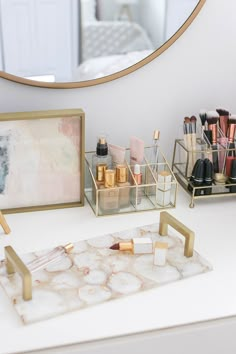 a vanity with various makeup products on it