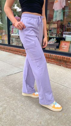 Lavender French Terry Straight Cargo Sweatpants Lavender Haze Cargo Sweats Get ready to lounge in style with our Lavender Haze Cargo Sweats! These French Terry Straight Cargo Sweatpants not only offer maximum comfort, but also elevate your loungewear game to a whole new level. Say goodbye to boring sweats and hello to the ultimate cozy and chic experience. Haze-y days never looked so good! Details Available in sizes Small, Medium, & Large 60% Cotton, 40% Polyester Sizing Small: 2/4, Medium: 6/8, Purple Full-length Cargo Pants With Pockets, Full Length Purple Cargo Pants With Pockets, Casual Purple Pants With Cargo Pockets, Purple Full-length Cargo Pants, Relaxed Fit Purple Pants With Side Pockets, Casual Purple Bottoms With Cargo Pockets, Casual Purple Cargo Pants With Pockets, Purple Bottoms With Side Pockets, Casual Purple Sweatpants For Loungewear