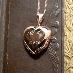 Create your personalised photo locket necklace with our rose gold four photo gold heart locket. This slimline, family locket opens out to reveal four secret photos. Add a special engraved message for the perfect Christmas gift, birthday gift or keepsake gift. Tap to learn more! Engravable Necklace, Picture Heart, Gold Heart Locket, Heart Locket Necklace, Heart Shaped Necklace