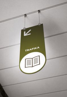 there is a sign that says trafika hanging from the ceiling