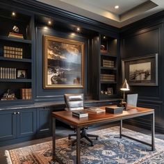 a home office with built in bookshelves and desk