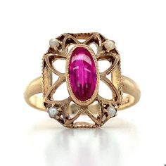 10k Yellow Gold Oval Shaped Synthetic Ruby And Pearl RingSize 5.75 2.6 Grams this is a beautiful vintage ring with this pinkish red center. This ring is in good condition while still showing its a vintage piece.  If you have any questions or concerns or would like a custom order, please message me and I will get back to you as soon as possible! serial number: AJ 521928 A Classic Pink Oval Ruby Ring, Formal Pink Oval Birthstone Ring, Vintage 14k Gold Pink Jewelry, Antique Oval Red Ruby Ring, Pink Hallmarked Victorian Ruby Ring, Vintage Oval Birthstone Ring Collectible, Vintage Oval Birthstone Ring As A Collectible, Vintage Oval Rose Gold Ring, Vintage Rose Gold Ruby Promise Ring