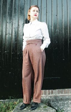 ITEM DESCRIPTION 1930s style mens suit trousers for women. These trousers are adapted from a 1930s mens pattern with wide fit, pleated front, very high waisted, fishtail back and buckle back. After many requests I have finally got around to make my signature mens trousers for ladies. The only thing that I changed is the basic hip to waist ratio and the length, everything else is exactly the same. The trousers are made of a warm and soft wool-viscose blend (55% wool) in a gorgeous herringbone twe Victorian Trousers Women, Tweed Trousers Outfit Women, Casual 1920s Outfit, 1940s Mens Clothing, 40s Mode, Mens Pattern, 1940 Style, Mens Suit Trousers, Trousers Mens