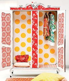 a red and white closet with polka dots on it