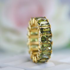 Emerald Cut Peridot Band, Green Gemstone Full Eternity Band, 18k Solid Gold Handmade Jewelry, Women Delicate Band, Personalized Gift For Her Maine Stone -Peridot Stone Creation - Lab Created  Stone Shape - Emerald Stone Color -Green Stone Size - 6x3 mm Birthstone- August Features: * Handmade * Ready To Ship * Brand New * All Ring Sizes Available * Suitable For Every Day * 14k Solid Gold / 18k Solid Gold / Gold Filled Over Sterling Silver * Purity Stamped * Fits True to Size * High Quality * Avai Luxury Green Half Eternity Band, Peridot Wedding Band, Peridot Ring Gold, Fine Gold Jewelry, Peridot Jewelry, Peridot Stone, August Birthstone, Engagement Ring Sizes, Birthstone Gifts