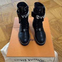 Like New Louis Vuitton Black Ranger Boot Size 38 See All Photos Luxury High-top Boots With Branded Heel Counter, Lv Boots, Black Ranger, Ranger Boot, Louis Vuitton Black, Louis Vuitton Shoes, Bootie Boots, Ankle Boots, Like New