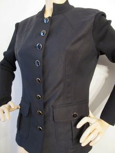 ST JOHN SPORT BRAND NEW FABULOUS  STUNNING  CASUAL JACKET  COTTON NYLON SPANDEX WOOL & RAYON KNIT SLEEVES KNIT COLLAR TWO POCKETS BLACK AND GOLD SJ SIGNATURE BUTTONS New with tags $1190.00 Size 8 bust 40" WAIST 34" length from nape of neck 24" sleeve length 24.5" across shoulders 16.5" Nape Of Neck, Knit Sleeve, Coat Black, Cotton Jacket, Knit Collar, Cotton Knit, Casual Jacket, Jacket Coat, Black Coat