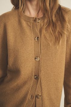 Our 100% cashmere Greta long-sleeve cardigan is the staple piece you need. Perfect for Layering your look and add a touch of something special. Wear it closed up to the top to play it preppy, or open for a more relaxed fit. Unisex and versatile as always, it allows you to express yourself and interpret it as you want, giving you the touch of elegance you need in every fit. Charlotte’s fashion tip: "I love how this piece follows my moods everyday ! When I’m playing the elegance card, I like to wear it on its own, closed, paired with a scarf. When I’m in the mood for a more casual outfit yet with the bit of sophistication I always like, but with the touch of sophistication I always crave for, I leave it open with a nice cashmere and silk top." A true staple piece! Cozy Everyday Cashmere Sweater, Cozy Cashmere Sweater For Everyday, Fall Fine Knit Cashmere Cardigan, Everyday Fall Sweater With Buttons, Everyday Button Sweater For Fall, Everyday Buttoned Sweater For Fall, Cozy Button-up Sweater For Loungewear, Cozy Outerwear For Layering With Button Cuffs, Cozy Outerwear With Button Cuffs For Layering