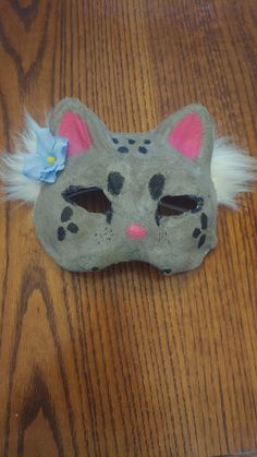 A home made liynx mask with a fake flower on the ear! Masquerade Mask With Whiskers, Costume Mask, Fake Flowers, Costume Accessories, Mask, Flowers