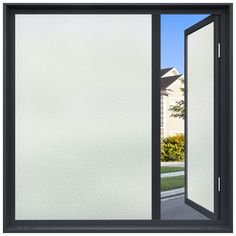 an open glass door with the view of a house in the back ground and grass behind it