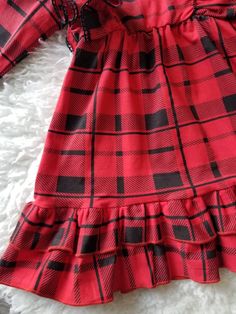 Shipping in about 5-7 business days! Need sooner purchase rush fee listing in my Etsy shop Running True to Size Listing is for dress only! Matching Suspender skirt and baby romper available in my Etsy Shop Looking for the cutest holiday dress ever!! You POP found it. This is a bright red and black plaid ruffled dress. This has cute double ruffles on the bottom of the dress and double ruffles on the sleeves. The fabric is 100% cotton so its a soft stretchy dress. The sleeves have a cute black cro Plaid Dress Holiday, Red Checkered Dress, Girls Christmas Dress, Toddler Christmas Dress, Holiday Clothing, Red Christmas Dress, Red Plaid Dress, Girls Holiday, Red Checkered