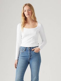 Slim-fitting and flattering, our Mars Corset Long-Sleeve Tee gives crop tops a whole new meaning. We designed it with a scoop neckline and a slim fit;and finished it off with a corset-inspired design. Your everyday crop top;upgraded Cut with a slim fit Features a scoop neckline Finished with a corset-inspired boning design White Levis, Shirt Blouses Tops, Scoop Neckline, Mars, Long Sleeve T Shirt, Levi's, Long Sleeve Tshirt, Long Sleeve Tees, Crop Top