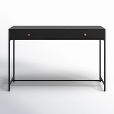 a black desk with two brass handles on the top and bottom, against a white background