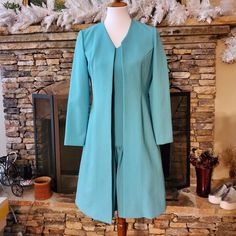 This Is A V-Neck Teal Dress Worn With The Long Open Jacket. It Is Custom Made And There Are "Ruffles" Near The Bottom Of The Dress (See Pictures). Size: No Size Bust: 17" Length: 36" Jacket: Length: 37" Armpit To Bottom Of Dress: 28 " Shoulder To Hand: 22" ; Armpit To Hand: 16" New Without Tags New Clothes Never Worn. Dry-Cleaning Only. Made In Korea Formal Blue V-neck Outerwear, Fitted Knee-length Jacket Dress For Spring, Fitted V-neck Outerwear For Formal Occasions, Elegant Knee-length Spring Outerwear, V-neck Spring Outerwear For Daywear, Fitted Knee-length Jacket Dress For Fall, Spring V-neck Outerwear For Daywear, Tailored Jacket Dress With Notch Lapel For Spring, Tailored Knee-length Jacket Dress For Spring