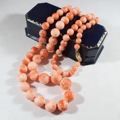 -Vintage 14k Gold Natural Angel Skin Coral Graduated Beaded Necklace -Total length: 27.25 in -Bead size: 6 mm ~ 12.6 mm -Total weight: 71.7 g -Marked 14k -Have hairline cracks Affordable Trendy Coral Jewelry, Affordable Handmade Coral Jewelry, 22k Coral Necklace, Affordable Coral Beaded Necklaces As Gift, Affordable Coral Beaded Necklace Gift, Cheap Vintage Orange Beaded Necklaces, Apricot Necklace, Coral Jewelry Vintage, Jewelry Knowledge