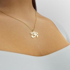 Our Plain Eye of Horus (Ra) Necklace is a simple yet elegant piece of jewelry. Available in either solid gold or sterling silver, this necklace features the iconic Eye of Horus symbol. The Eye of Horus symbolizes protection, healing, and wisdom, and has been revered in ancient Egyptian culture for centuries. With its timeless design and powerful symbolism, this necklace is perfect for everyday wear or special occasions. Add it to your collection today and channel the power of the Eye of Horus! Symbolic Gold Plated Necklace With Polished Finish, Symbolic Rose Gold Necklace, Symbolic Engraved Initial Pendant Jewelry, Symbolic Necklace With Polished Finish As Gift, Symbolic Necklace With Polished Finish For Gift, Spiritual 14k Gold Initial Pendant Jewelry, Symbolic Rose Gold Pendant Jewelry, Rose Gold Symbolic Pendant Jewelry, Symbolic Rose Gold Plated Jewelry